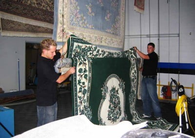 Men cleaning oriental rugs in Oakville